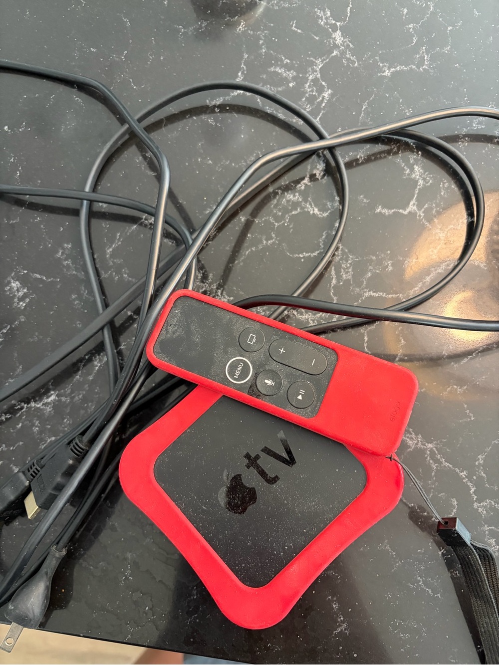 Apple TV with Red Silicone Sleeve and Matching Remote Cover